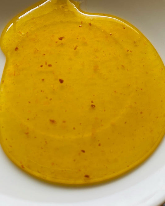 What Are the Little Specks in Raw Honey?